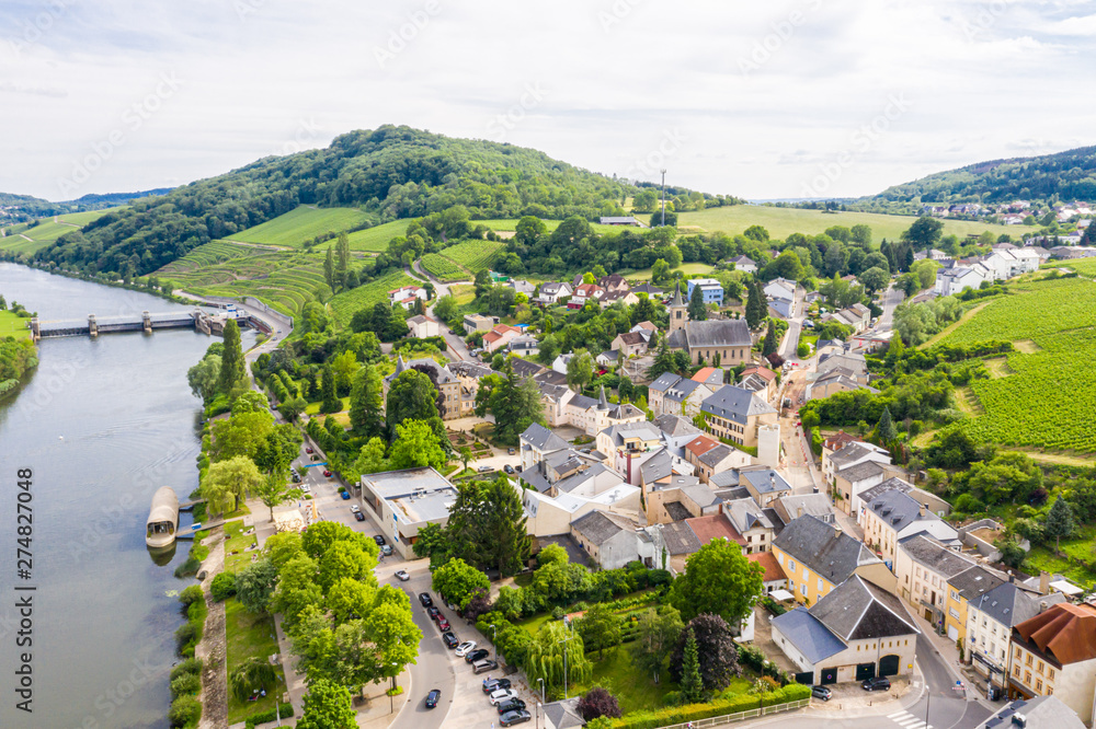 Aerial view of Schengen town center over River Moselle, Luxembourg, the place where Schengen Agreement signed, the birthplace of a Europe without borders. Tripoint of borders with Germany and France
