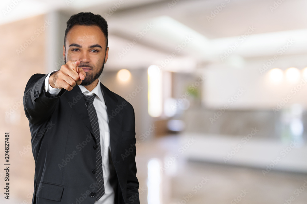 African business man poiting at you, isolated African business man poiting at you, isolated