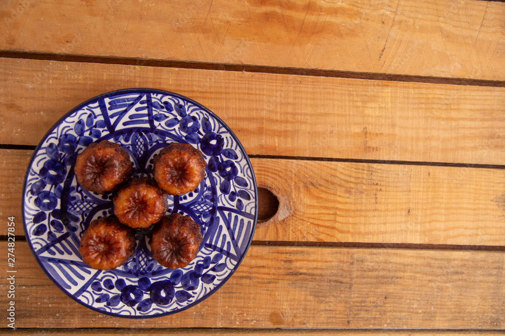 French pastry Caneles de bordeaux rum and vanilla flavor thick caramelized.. French pastry Caneles de bordeaux rum and vanilla flavor thick caramelized..