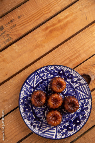 French pastry Caneles de bordeaux rum and vanilla flavor thick caramelized..