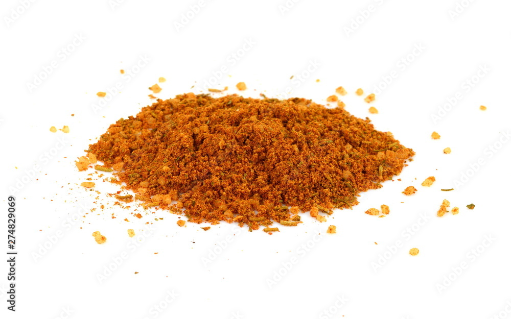 Grounded spice ingredient of dry mix vegetables isolated on white. Chicken spices. A pile of a yellow spice mix. Spices consist dried dehydrated vegetables carrot paprika onion garlic parsnip parsley 