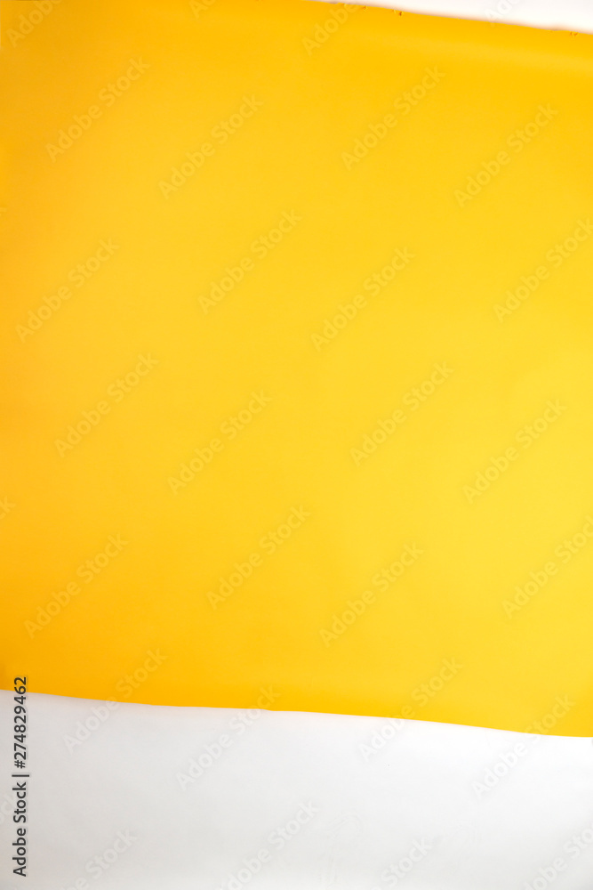 Top down view of yellow paper photographic background. Top down view of yellow paper photographic background.