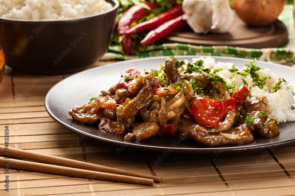 Chinese sticky pork sirloin roasted with a sweet and savory sauc Chinese sticky pork sirloin roasted with a sweet and savory sauc