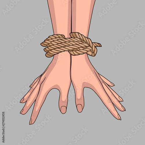 Bound hands isolated on gray background. Hands tied with rope.
