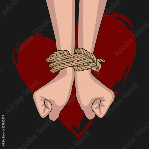 Bound hands isolated on the background of a red heart. Hands tied with rope. Clenched fists. Black Background. 