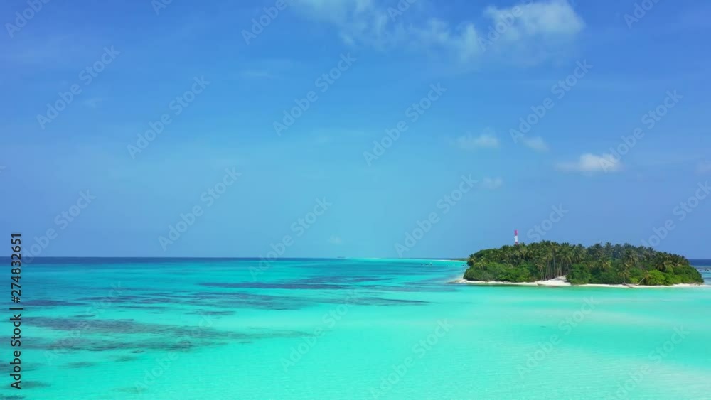 Aerial view the turquoise sea in the Dominican republic. A tropical island on the left. Dolly out. Aerial view the turquoise sea in the Dominican republic. A tropical island on the left. Dolly out.