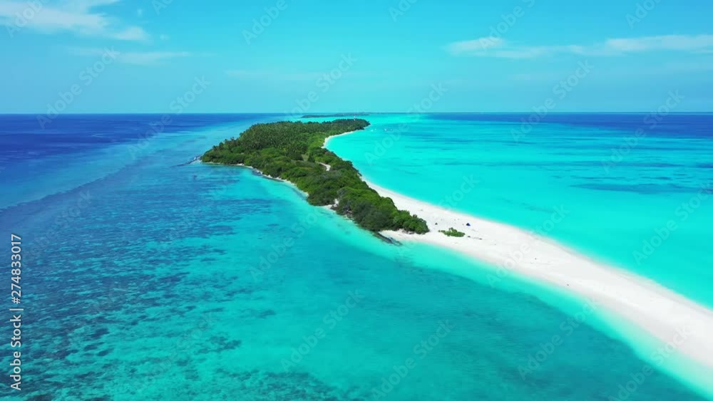 Aerial perspective of a tropical island with trees, that turns into sand in the foreground. In turquoise water in Bali. Truck left Aerial perspective of a tropical island with trees, that turns into sand in the foreground. In turquoise water in Bali. Truck left