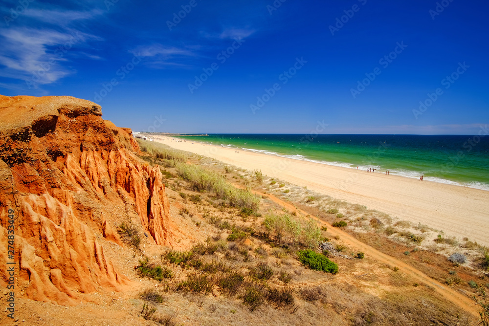 View on the beautiful beach Praia da Rocha Baixinha Nascente in Algarve, Portugal.