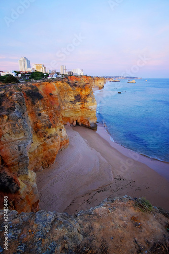 View on beautiful cliff in Algarve. Beach Careanosy in Portimao. Vacation in Portugal. photo