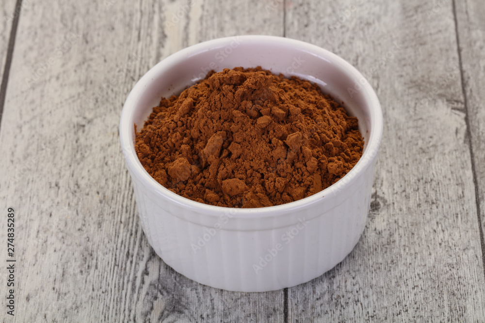 Cocoa powder in the bowl Cocoa powder in the bowl