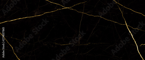 czarne tło marmuru z żółtymi żyłkami