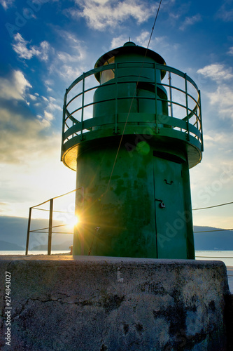 green lighthouse in the gulf of la spezia