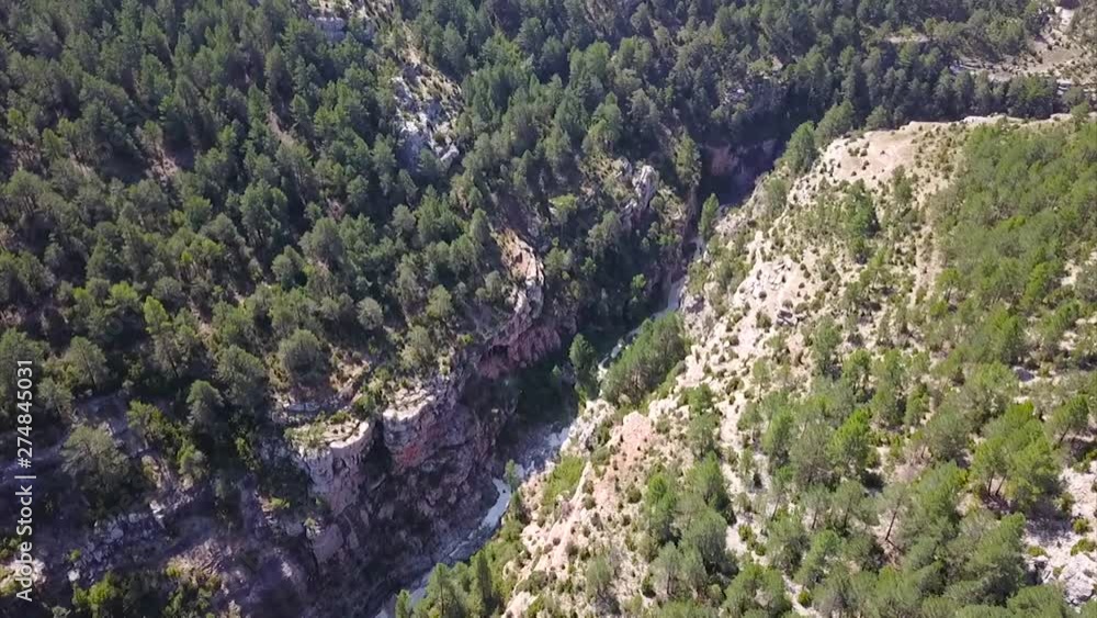 Drone flying over the throat of the Pitarque river in Teruel (Spain) Drone flying over the throat of the Pitarque river in Teruel (Spain)
