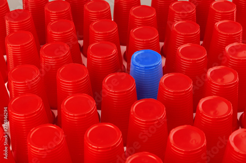 Large group of disposable plastic cups, red and blue