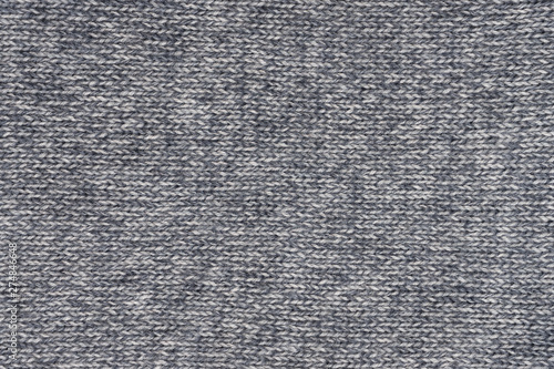 Grey woolen knitted texture with horizontal stitching. Part of sweater.