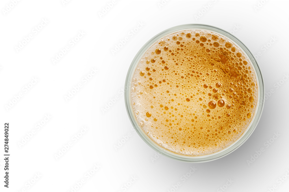 top view of beer bubbles in glass cup on white background. empty space for design. top view of beer bubbles in glass cup on white background. empty space for design.