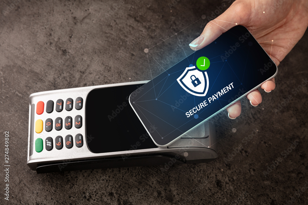 Hand paying on terminal with smartphone in secure payment system
 - obrazy, fototapety, plakaty 