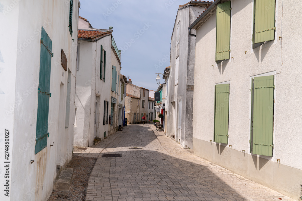 typical authentic cobblestone street in Saint Martin de Re France