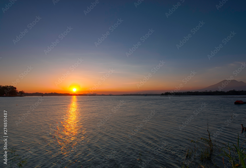 Beautiful sunsets on the edge of the lake