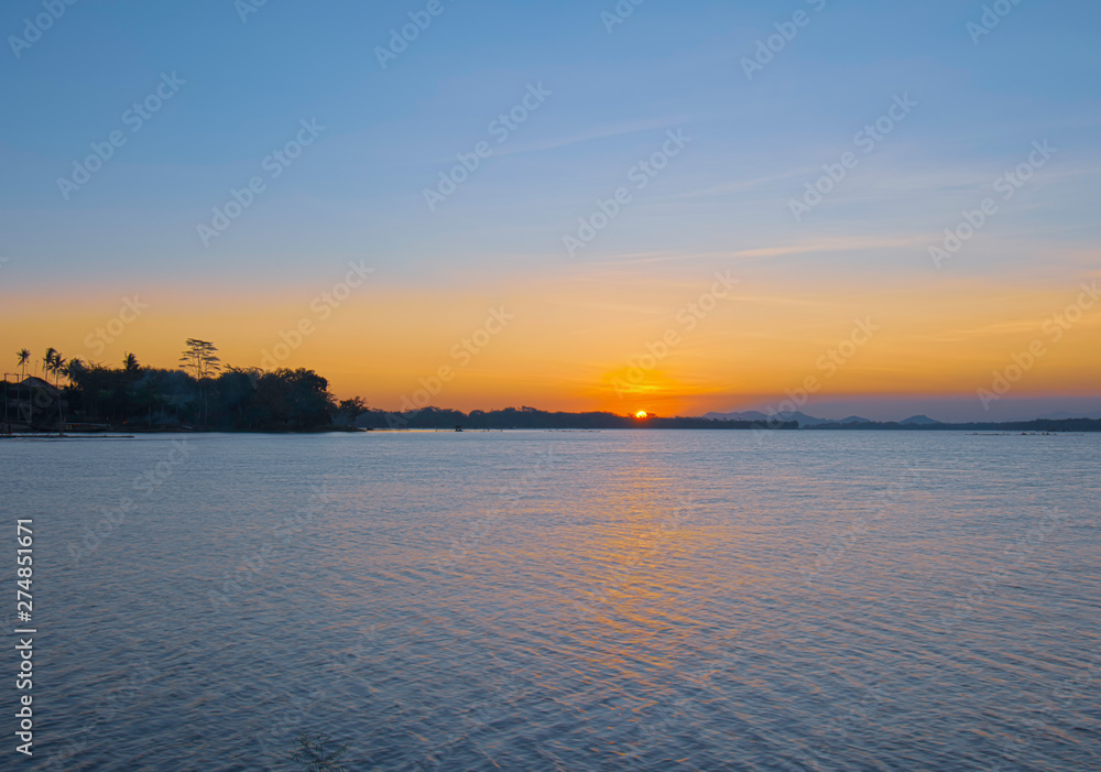 Beautiful sunsets on the edge of the lake