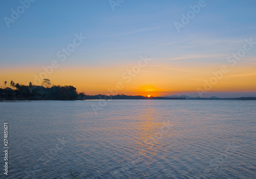 Beautiful sunsets on the edge of the lake © gunungkawi