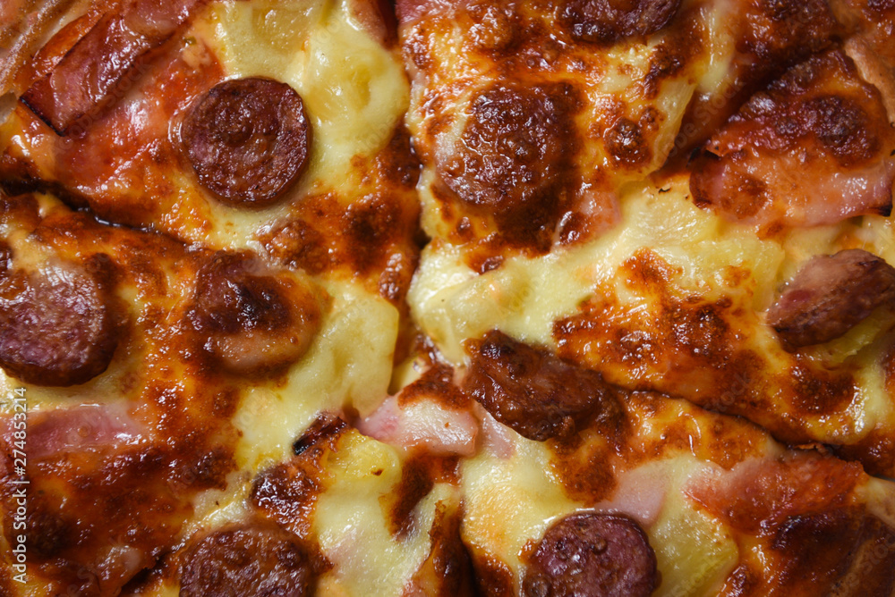 Close up of Pizza top view / delicious tasty fast food italian traditional pizza cheese Close up of Pizza top view / delicious tasty fast food italian traditional pizza cheese