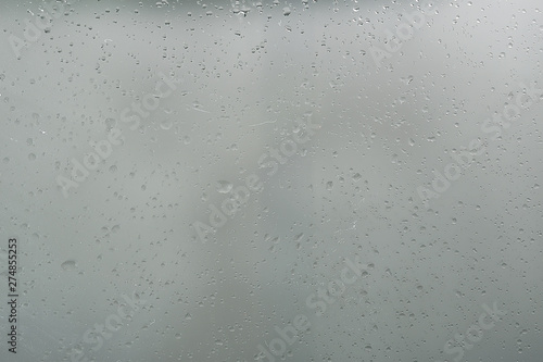 Photography wet glass background condensate / abstract rain, drops texture on transparent gl