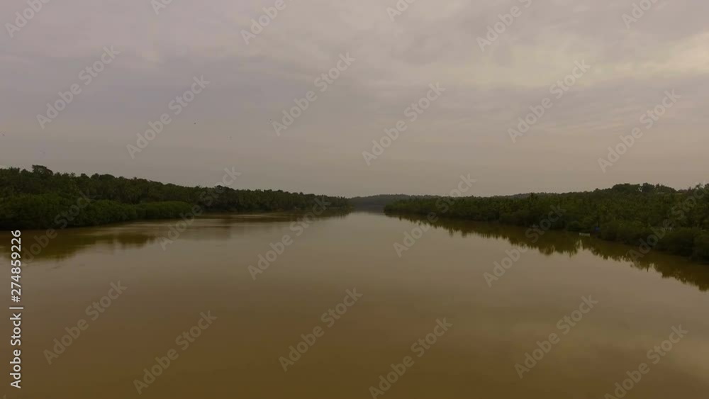 Beautiful view of big river with forest in Anjarakandy, Kerala. Beautiful view of big river with forest in Anjarakandy, Kerala.
