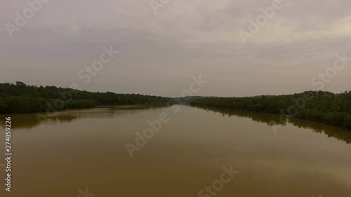 Beautiful view of big river with forest in Anjarakandy, Kerala. photo