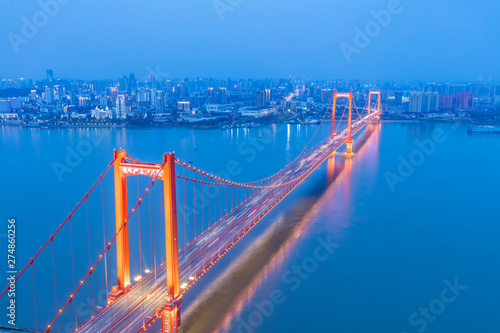 Island Yangtze river bridge. Located in wuhan, the largest city in central China. The Yangtze river is the longest river in China. Modern traffic background.