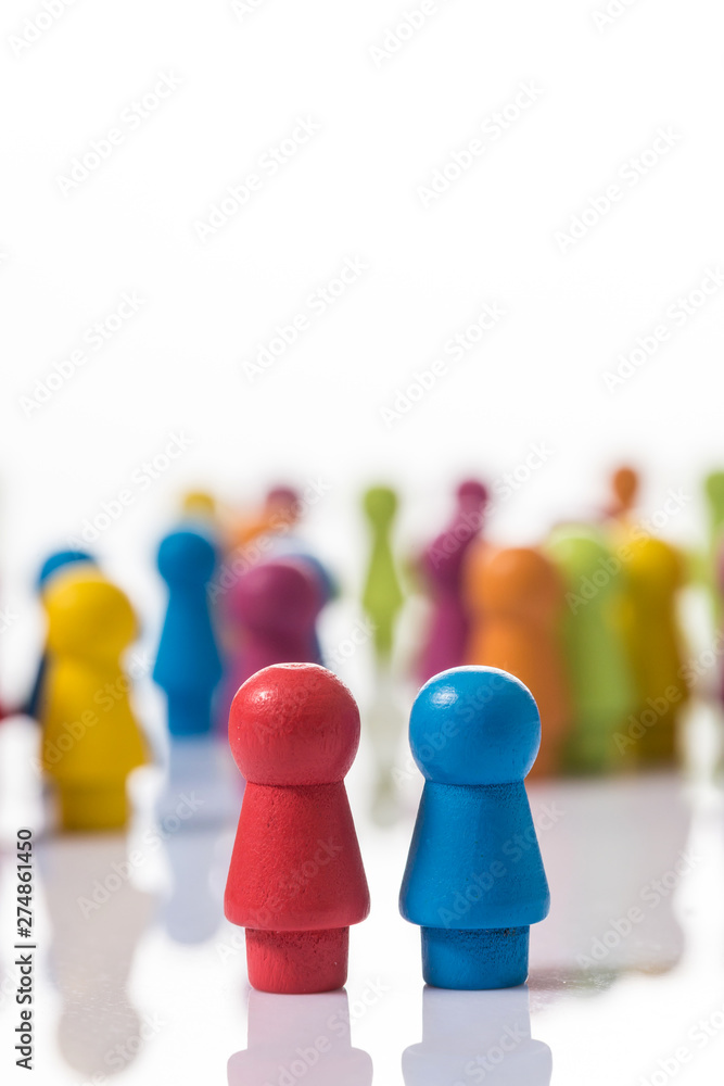 Wooden chess pieces shaped like human figures Wooden chess pieces shaped like human figures
