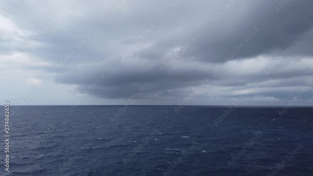 Ocean storm, black clouds, high wave and rain Ocean storm, black clouds, high wave and rain
