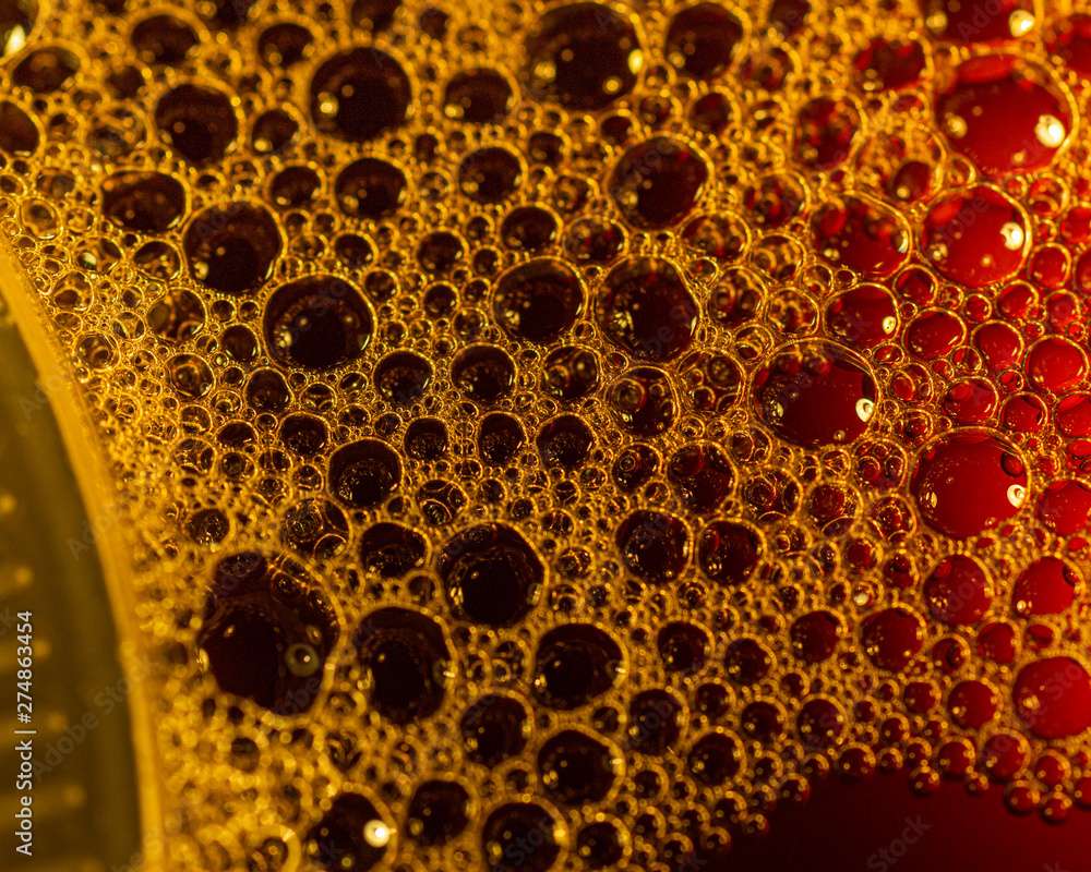 Fototapeta A honeycombe of bubbles in red and gold forming a perfect background or abstract artwork