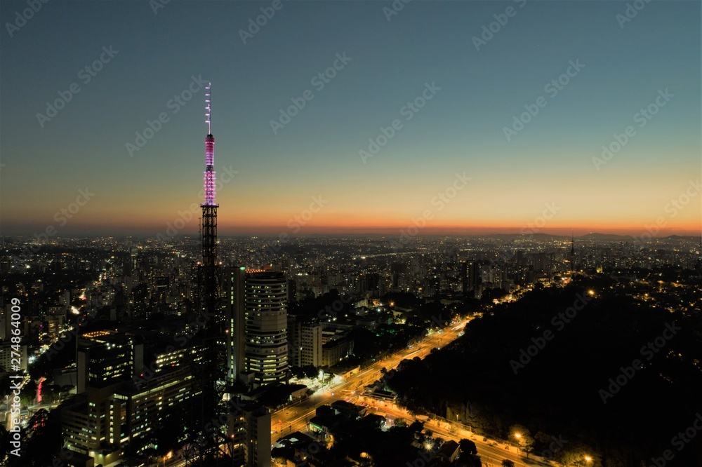 Sunset aerial view in São Paulo, Brazil. Great landscape. Explosion of colors on skyline. Business travel. Travel destination.