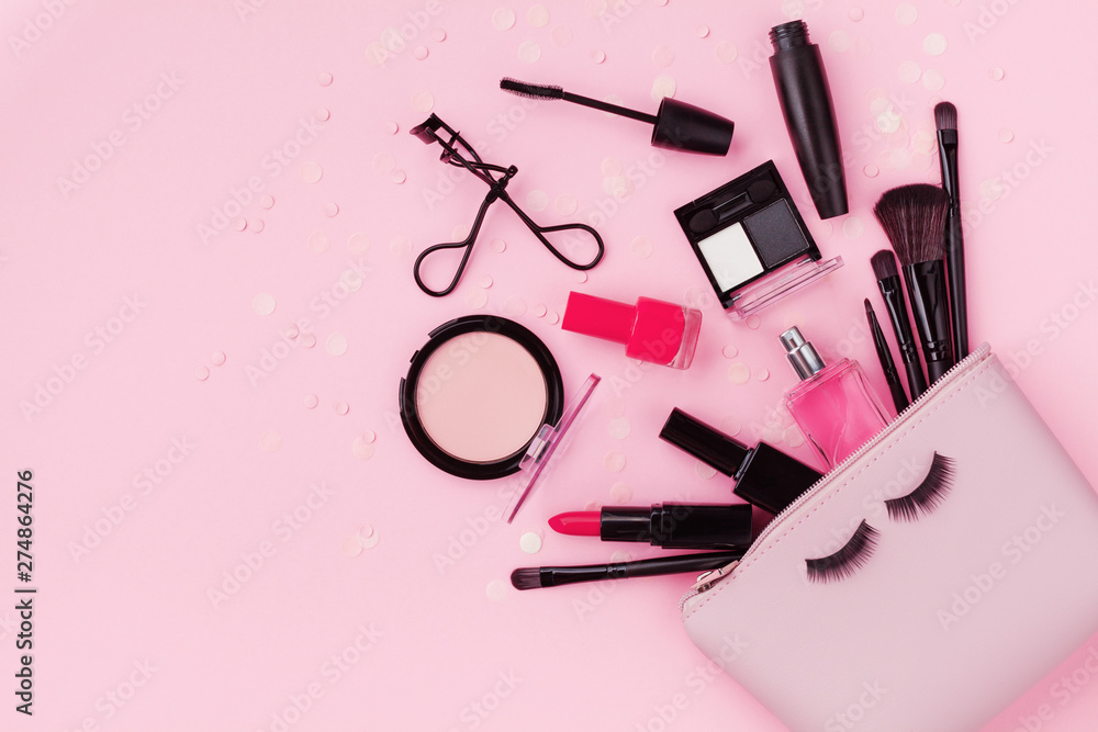 Fotka „Woman makeup background with beauty products and cosmetics. Top view  on pink table and flat lay style. ..“ ze služby Stock | Adobe Stock