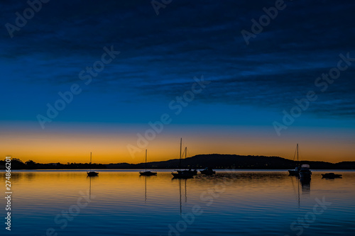 High Clouds, Boats, Reflections and Sunrise on the Bay © Merrillie