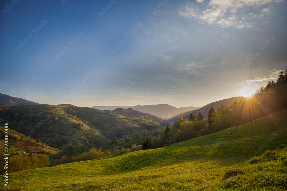 Fototapeta premium Sunset in the mountains landscape. Carpathian, Ukraine.