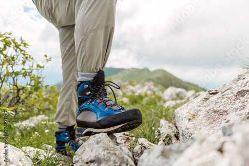 Hiker boot, standing on a rock