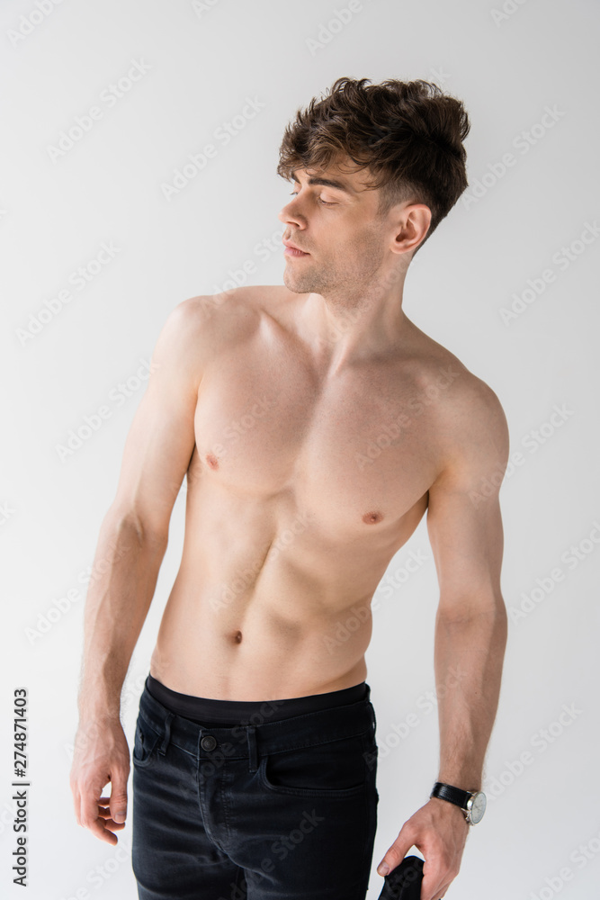 shirtless muscular man in wristwatch isolated on grey