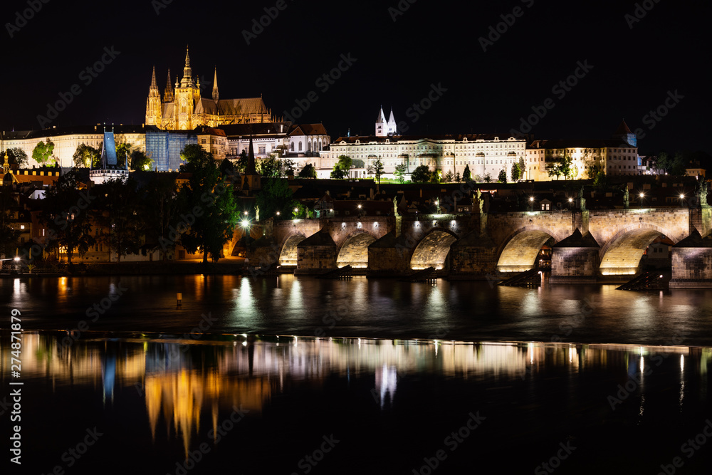 Charles bridge, famous landmark and travel destination at night in Prague, Czech Republic