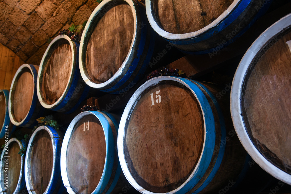 Wine cellar with oak barrels Wine cellar with oak barrels