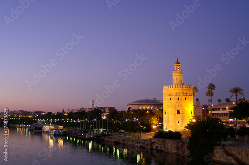 Seville  Spain . Night view of the Torre del Oro in the city of Seville