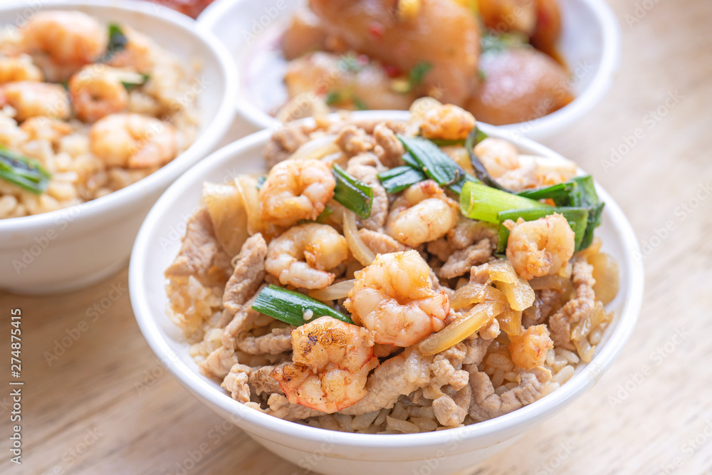 Braised shrimp over rice - Taiwan famous traditional street food. Soy-stewed prawn on cooked rice. Travel concept, top view, copy space, close up Braised shrimp over rice - Taiwan famous traditional street food. Soy-stewed prawn on cooked rice. Travel concept, top view, copy space, close up