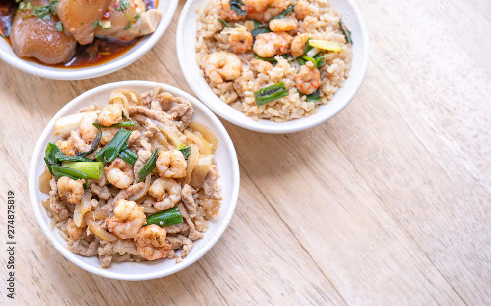 Braised shrimp over rice - Taiwan famous traditional street food. Soy-stewed prawn on cooked rice. Travel concept, top view, copy space, close up Braised shrimp over rice - Taiwan famous traditional street food. Soy-stewed prawn on cooked rice. Travel concept, top view, copy space, close up