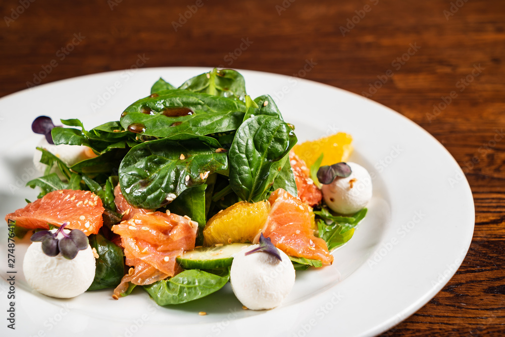 caesar salad with salmon fish caesar salad with salmon fish
