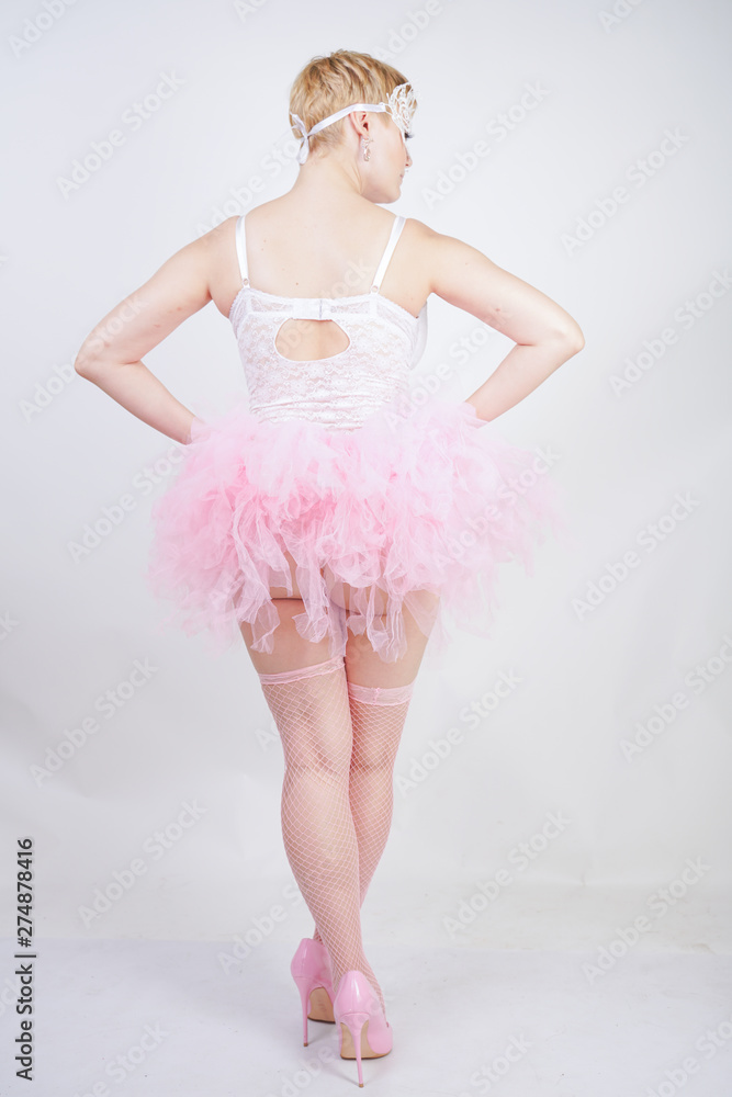 plus size woman in white pink ballerina dress plus size woman in white pink ballerina dress