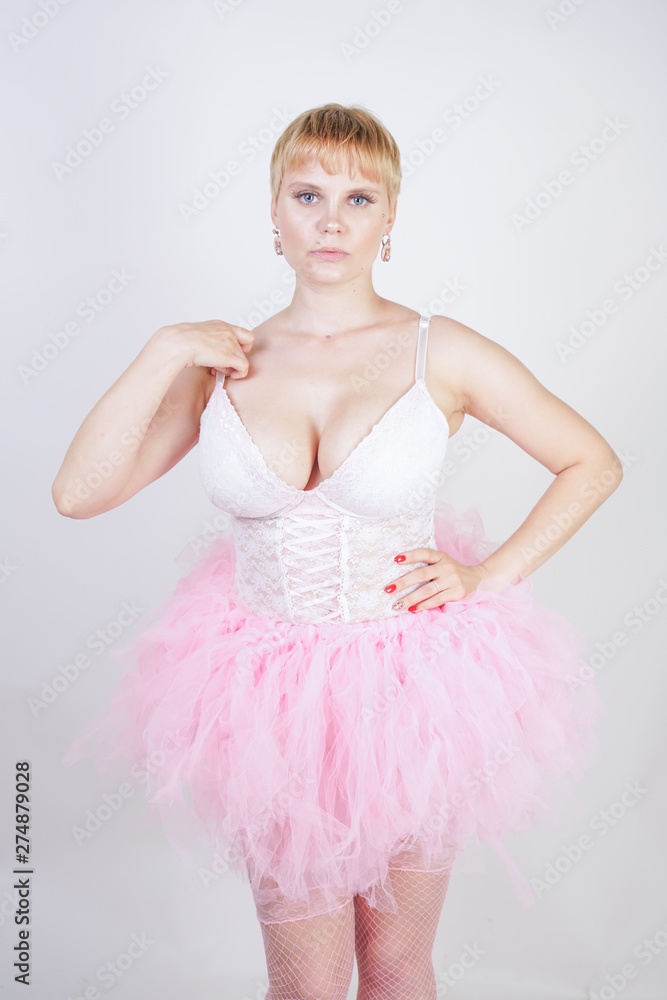 Naklejka premium plus size woman in white pink ballerina dress 