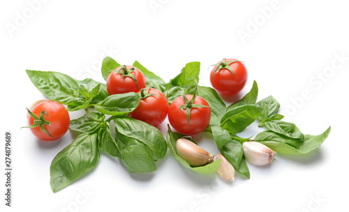 Fresh vegetables and spices on white background