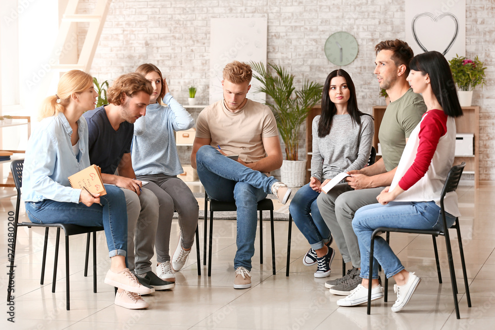 People at group therapy session People at group therapy session
