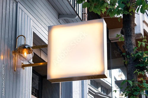 signboard mockup and template empty frame for logo or text on exterior street advertising city shop background, modern flat style
